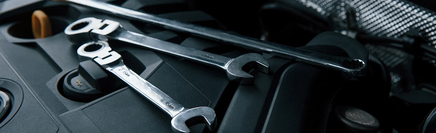 Wrenches on a Modern Car Engine